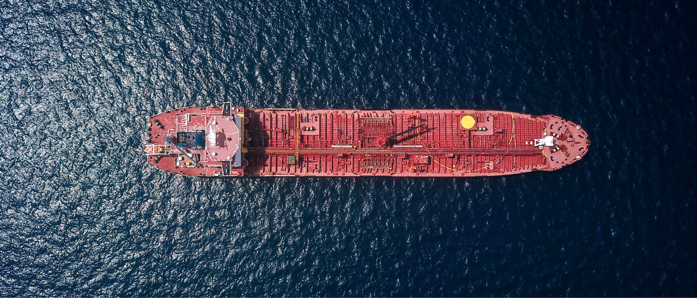 Aerial view of a ship surrounded by water. Photocredit: Shaah Shahidh